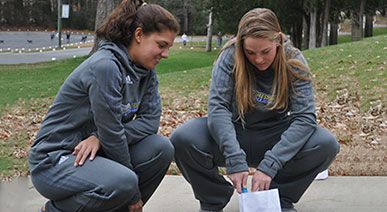 students lighting Luminary