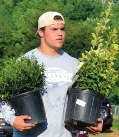 Limestone Football Team Volunteers To Repair Homes