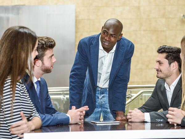 Group of multiethnic busy people working in an office - business administration management leadership