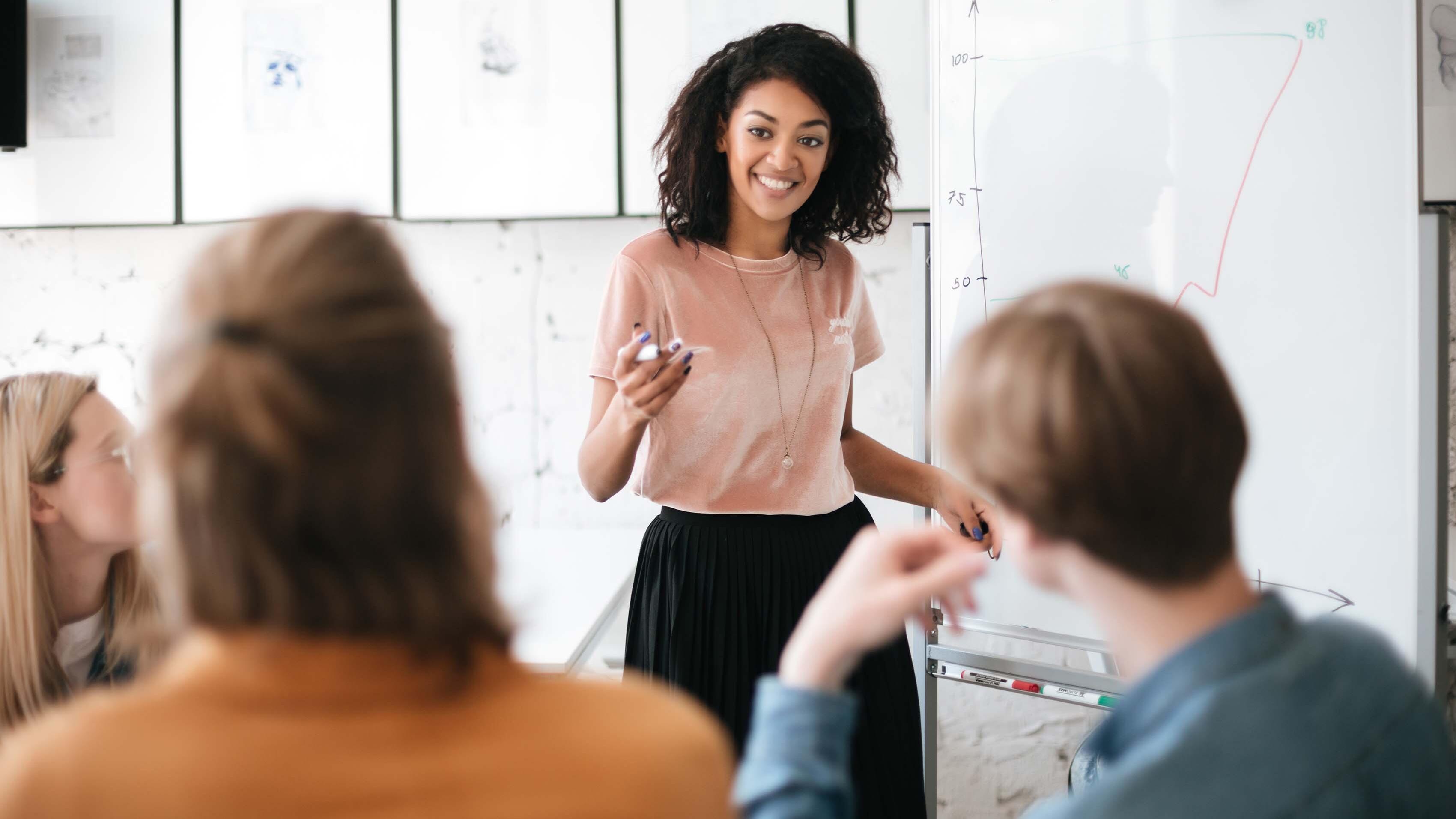 Communication - Woman speaking to group