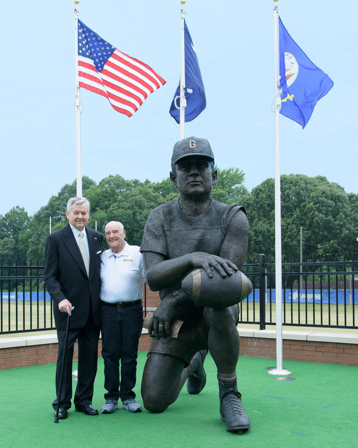 Bob Prevatte with Jerry Richardson - Statue pose