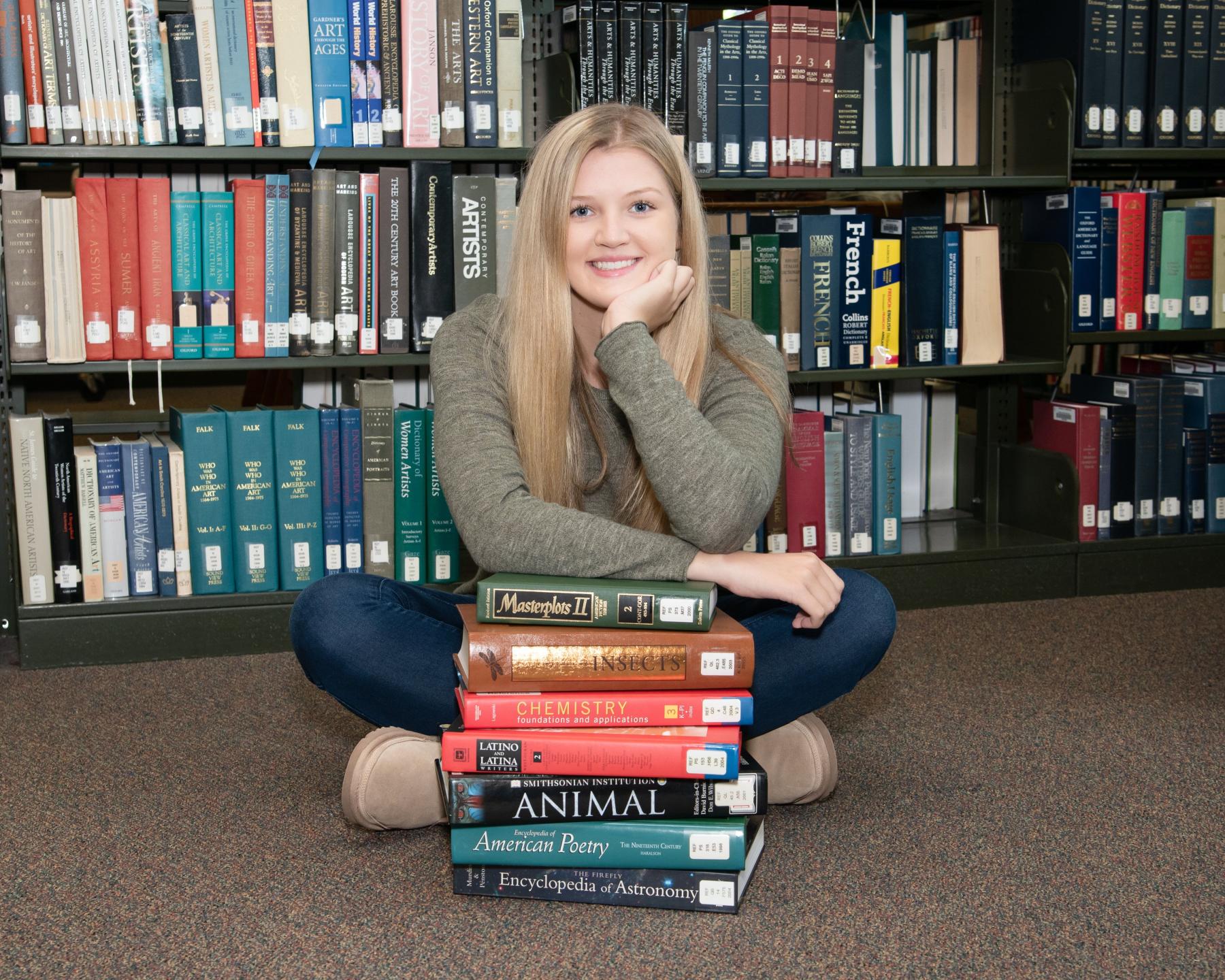 student with books