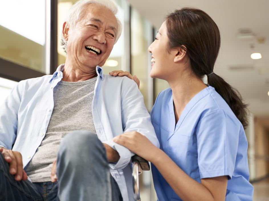 Nurse caring for elderly person